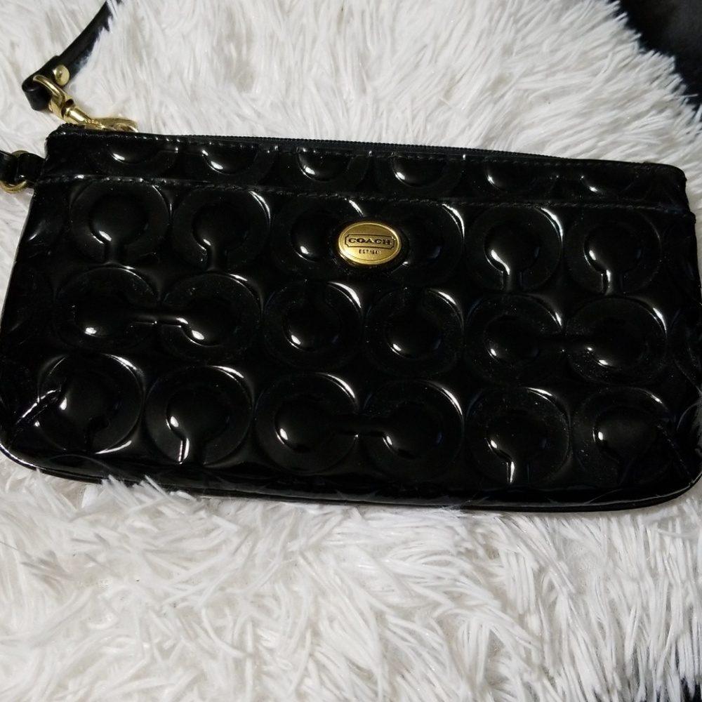 Coach  black wristlet.